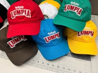 a group of hats with the word lumpa on them